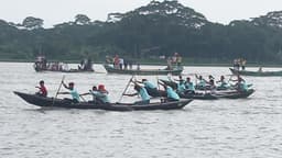 সুগন্ধা নদীতে উৎসবের আমেজে ঐতিহ্যবাহী নৌকা বাইচ