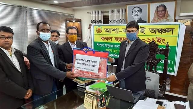 আত্রাইয়ে আশার কম্বল হস্তান্তর