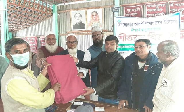 ভূরুঙ্গামারীতে বাগভান্ডার আদর্শ পাঠাগারের শীতবস্ত্র বিতরণ