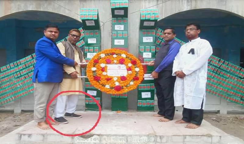 শহীদ বেদীতে জুতা পায়ে প্রধান শিক্ষক, তোলপাড়