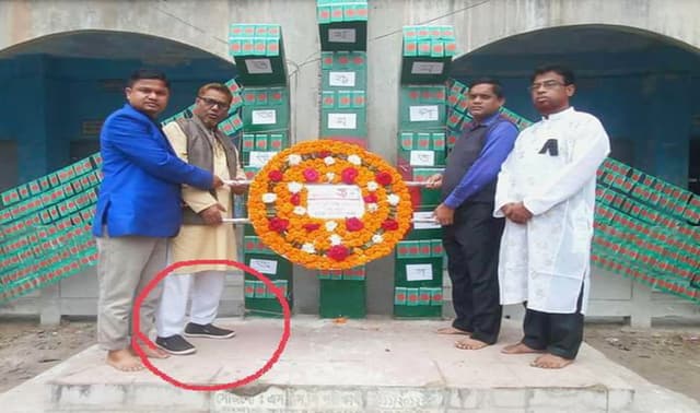 শহীদ বেদীতে জুতা পায়ে প্রধান শিক্ষক, তোলপাড়