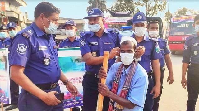 সাপাহারে পুলিশের সচেতনামূলক পথসভা