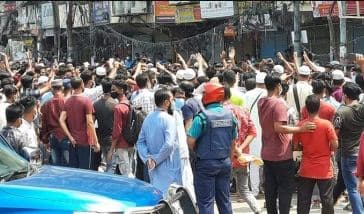 দোকান খুলতে মালিক-কর্মচারীদের বিক্ষোভ