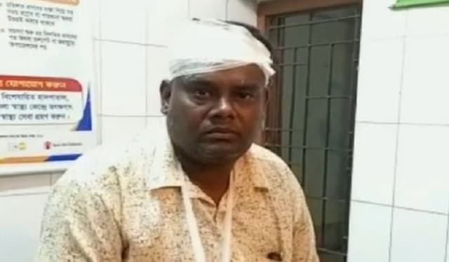আসামি ধরতে গিয়ে আসামির ছেলের কোপে এসআই আহত