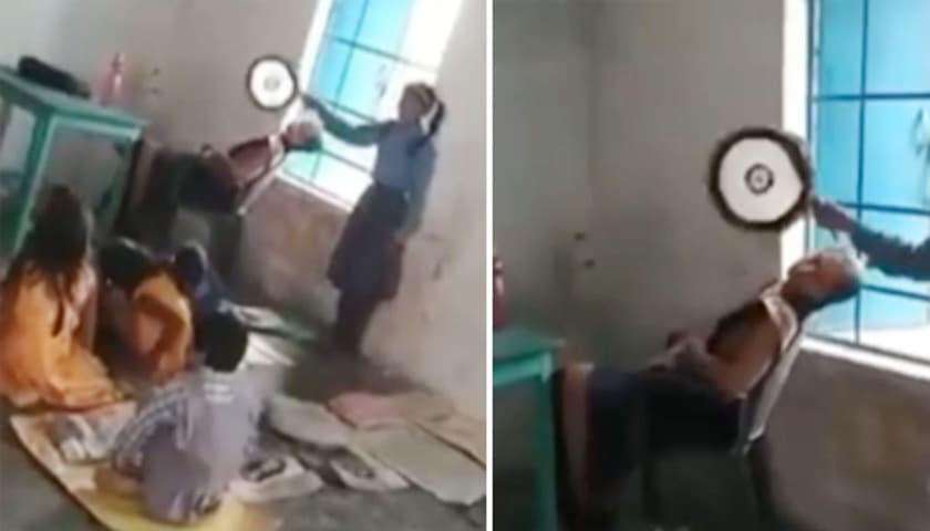 শ্রেণিকক্ষে ঘুমাচ্ছেন শিক্ষক, বাতাস করছে শিক্ষার্থী