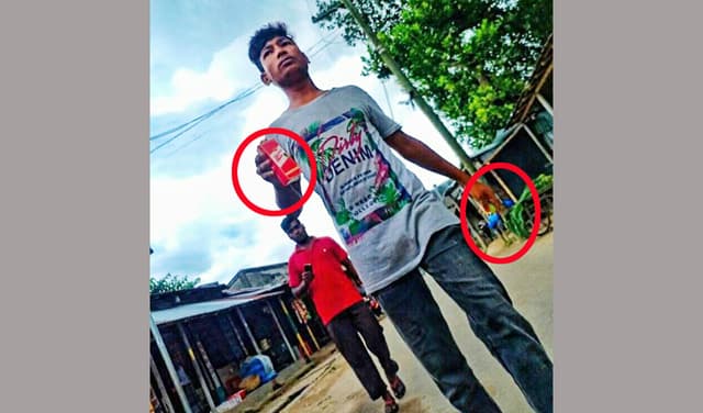 এবার মদের প্যাকেট হাতে রাস্তায় সেবনের মহড়া