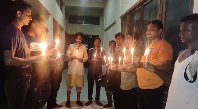 ধামইরহাটে শোকের মাসে প্রথম প্রহরে মোমবাতি প্রজ্জ্বলন