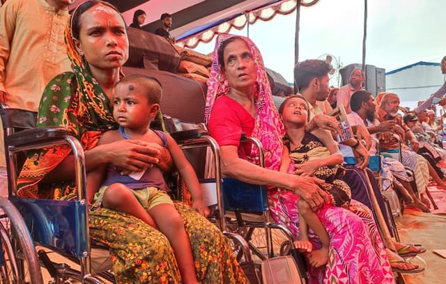 শোকের মাসে হুইল চেয়ার সহ খাদ্য সামগ্রী পেলেন প্রতিবন্ধীরা