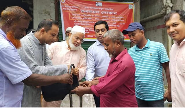 ধামইরহাটে ওএমএস এর চাল বিতরণ উদ্বোধন