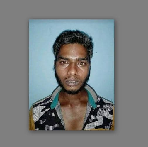 পার্তীপুর থানার পালাতক আসামি হিলিতে আটক